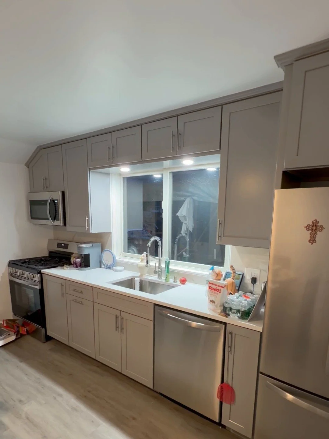 Remodeled kitchen with gray shaker cabinets, quartz counters and stainless appliances, Budd Lake NJ