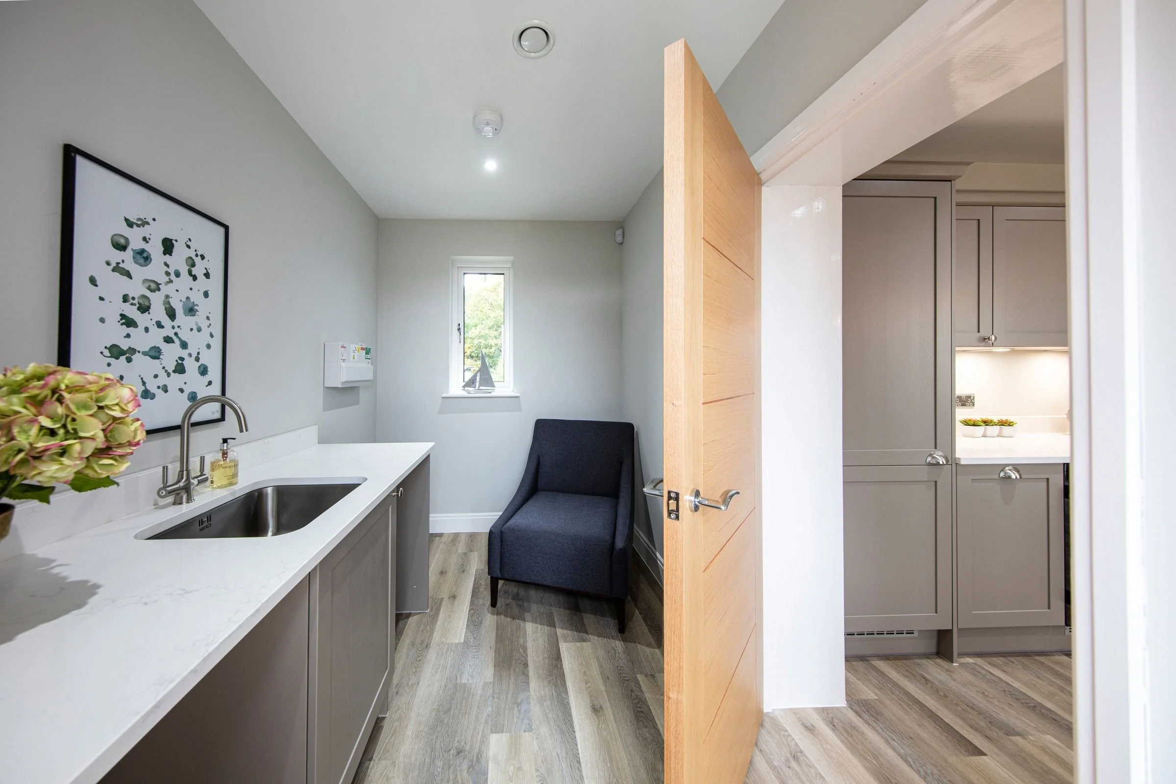Fitted utility room adjoining the kitchen.