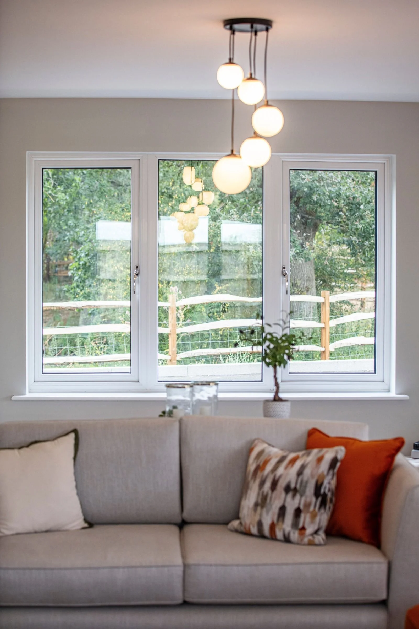 Lounge seating beside the garden-facing window.
