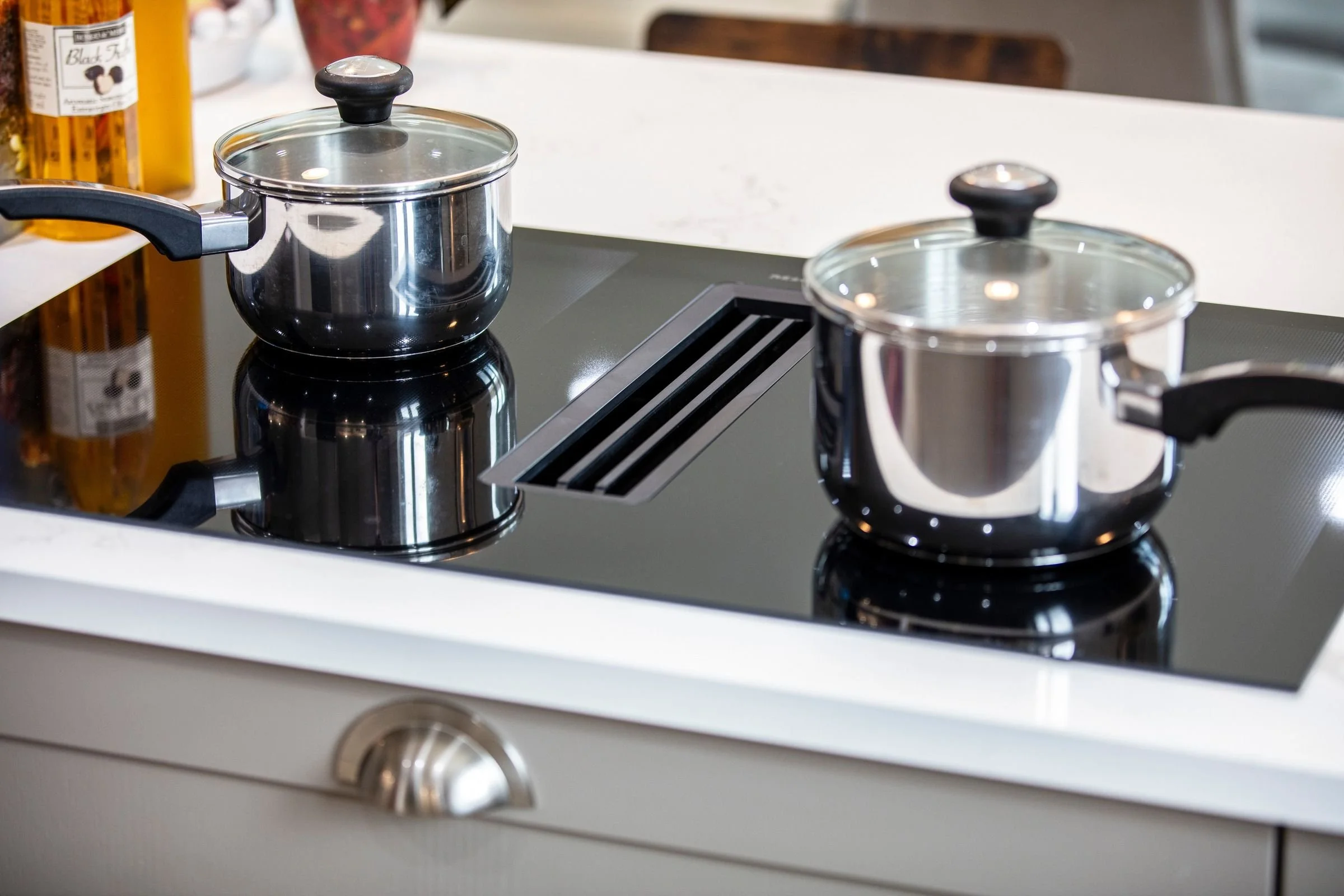Miele induction hob with integrated extractor.