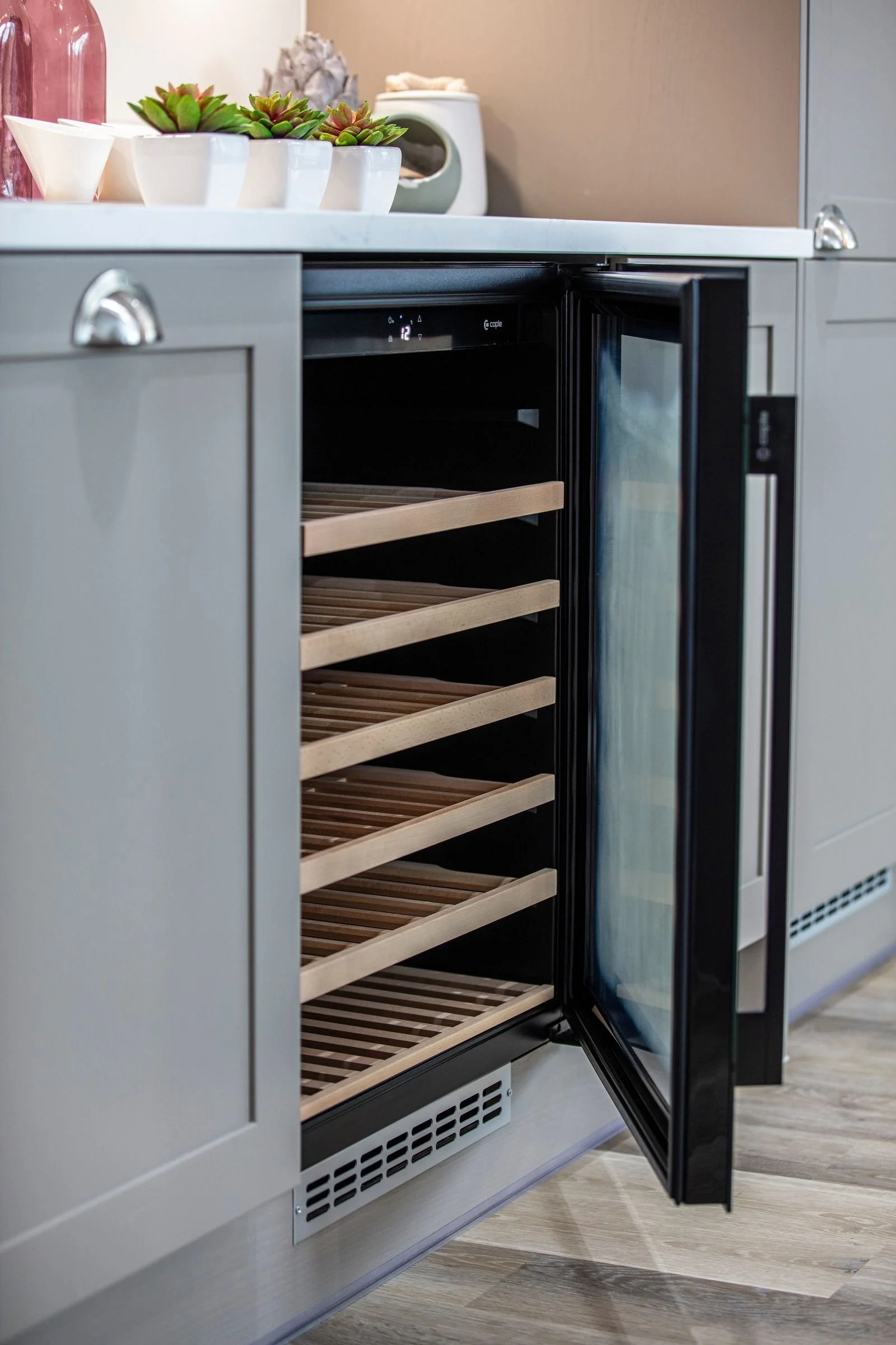 Built-under Caple wine cooler.
