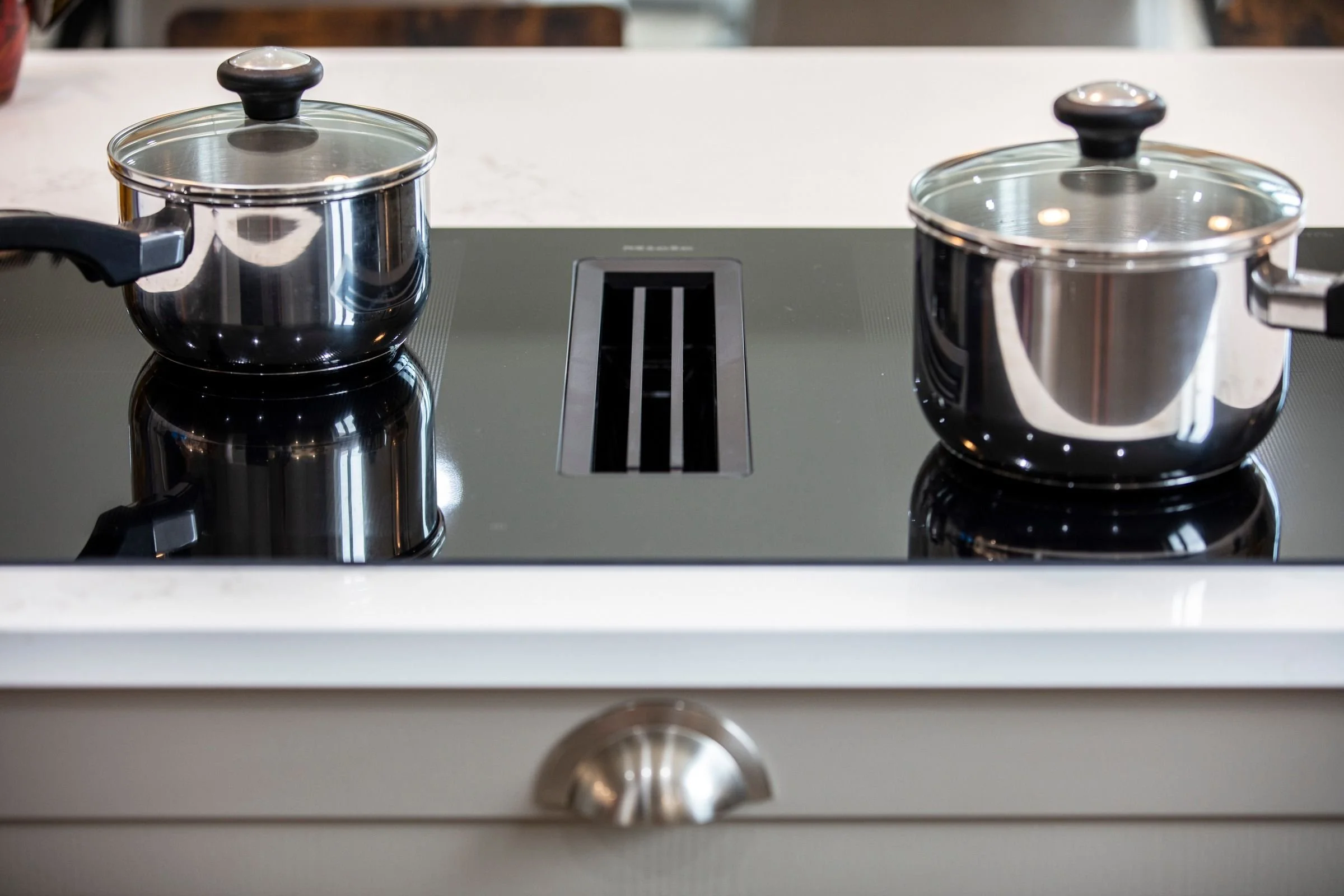 Miele induction hob with integrated extractor.