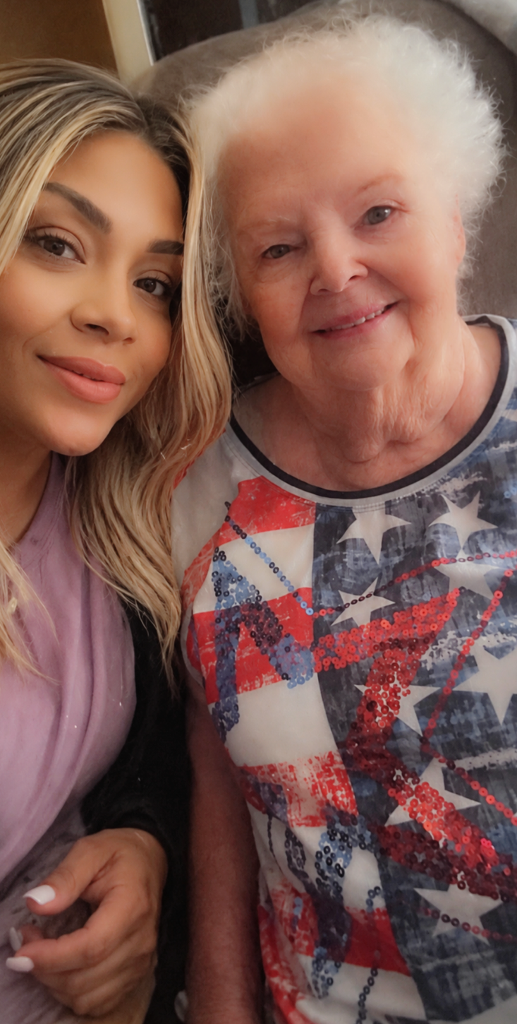 A caregiver sharing a warm moment with a client.