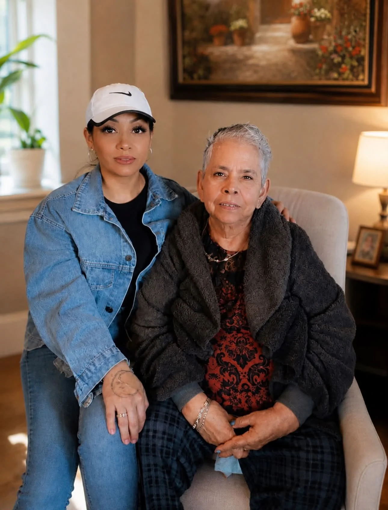 A caregiver spending time with a client in her home.