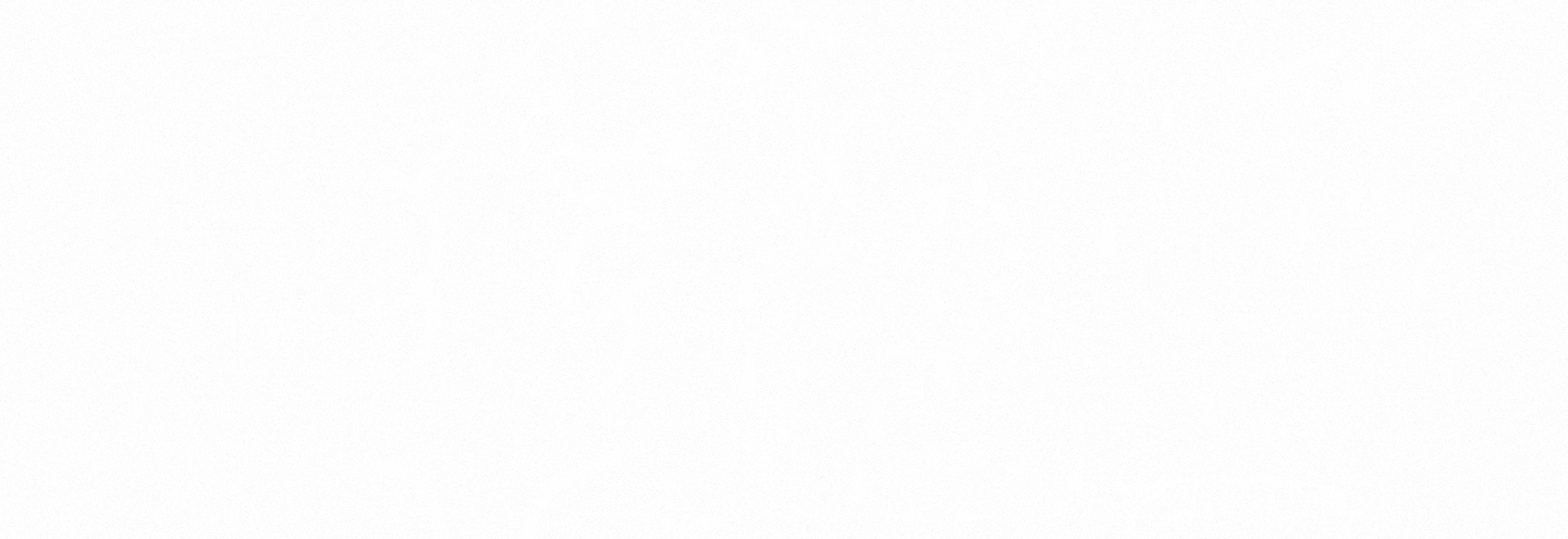 A sandy beach with some abstract wave patterns in the sand.