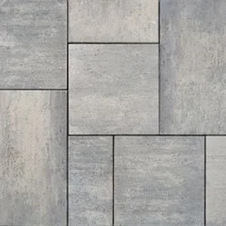 Pavage en carreaux de pierre grise avec motifs rectangulaires.