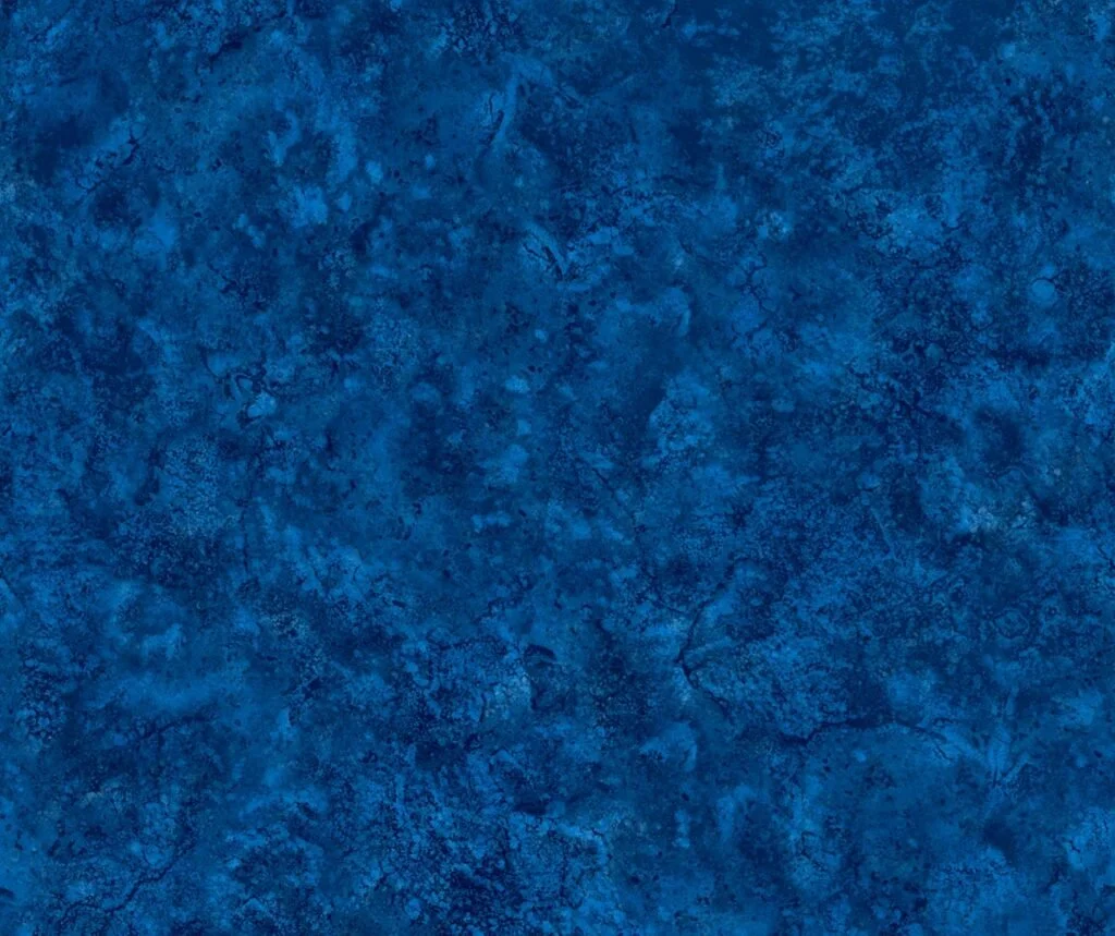 Texture de surface bleu foncé, ressemblant à une pierre ou un matériau peint avec des détails granuleux et marbrés.