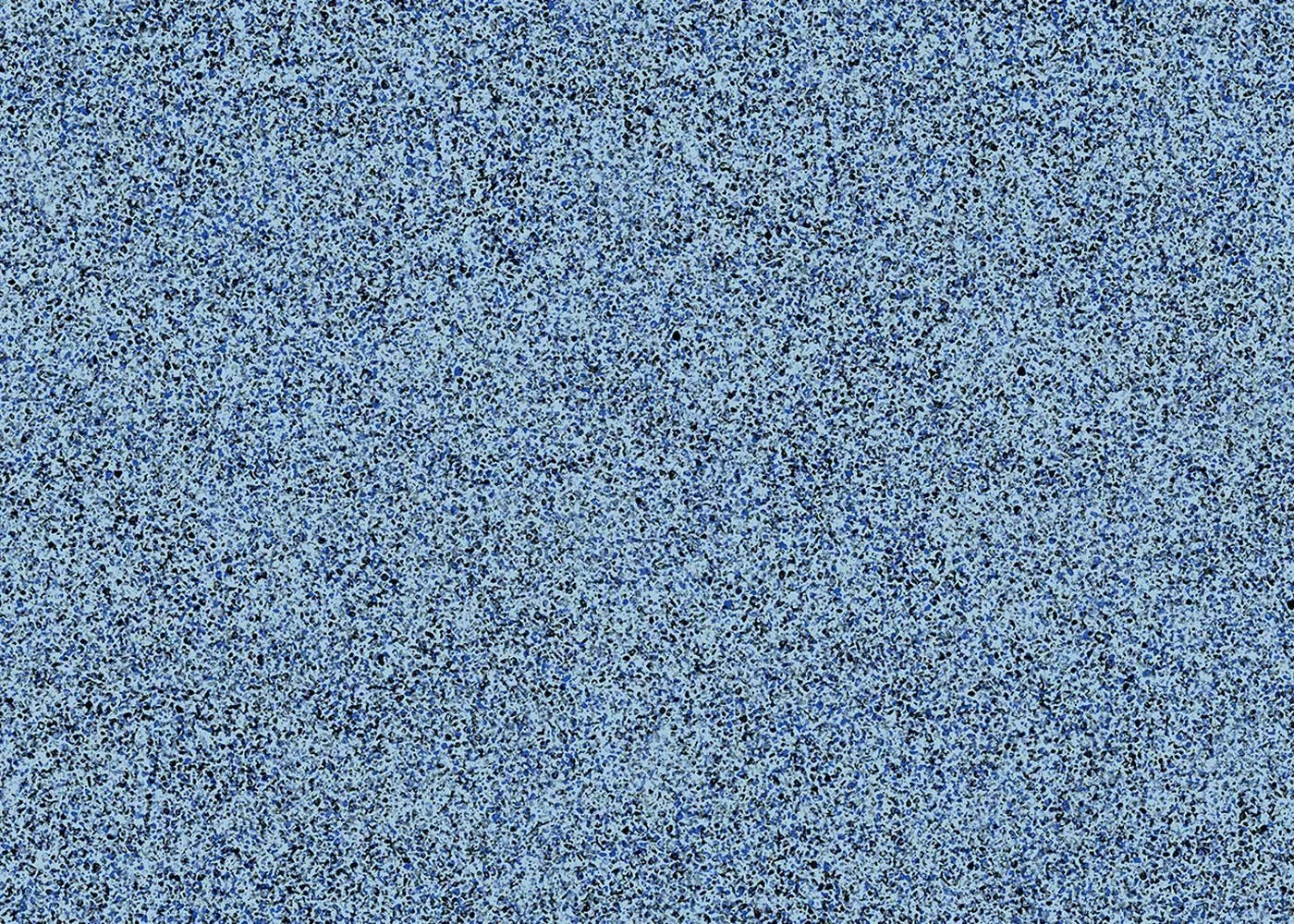 Surface en béton terrazzo bleuté avec splatters et petits motifs.