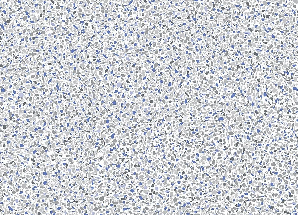 Revêtement de sol en terrazzo avec des éclats blancs, gris et bleus.