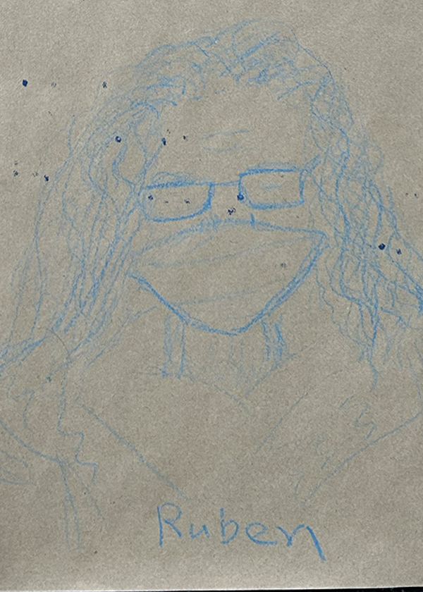 Child's drawing of a person with glasses and curly hair, smiling, with the name 'Ruben' written below.