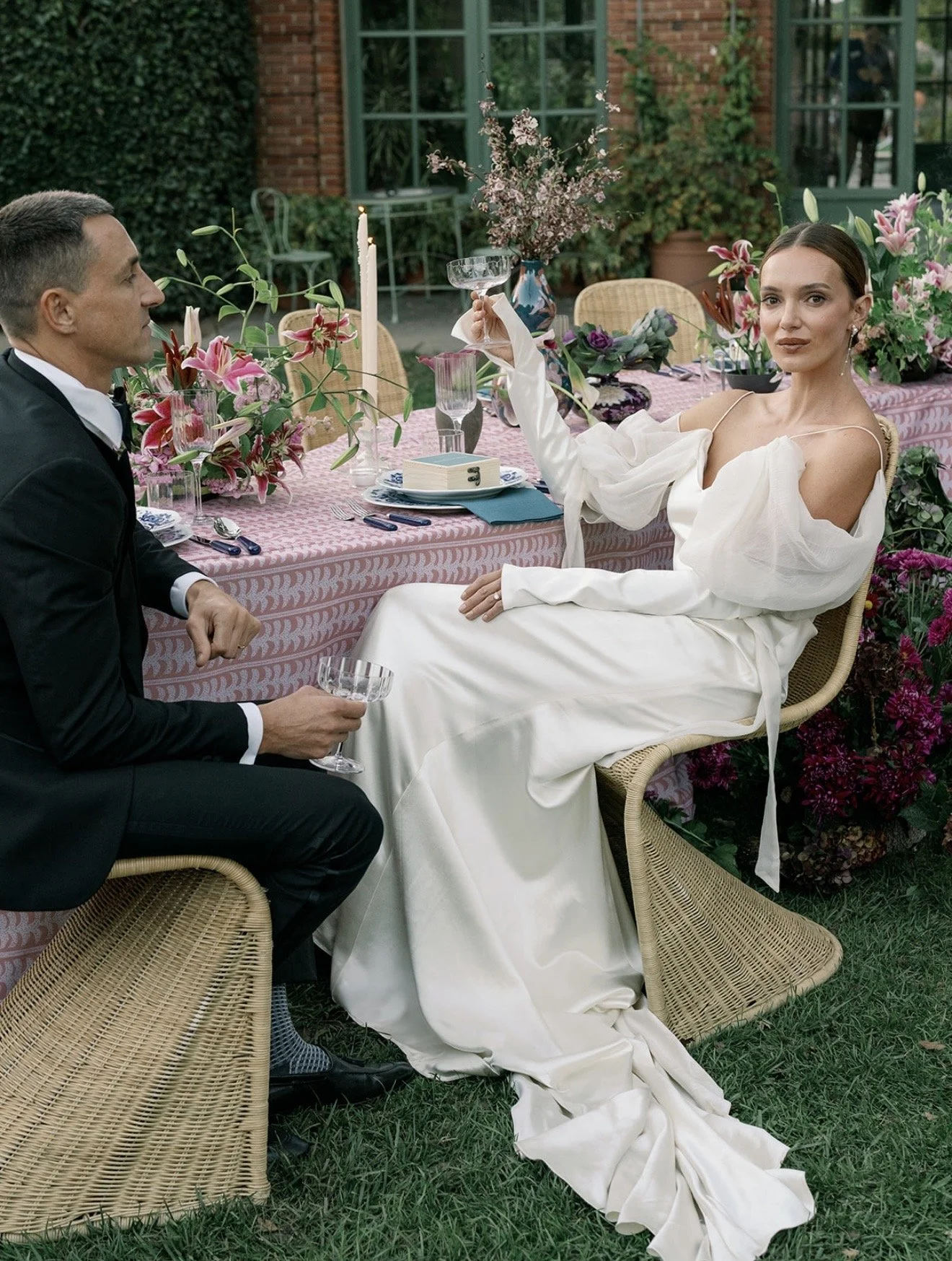 Julia and Rob Hoadley enjoying an outdoor dining experience for a luxury hospitality lifestyle shoot. 