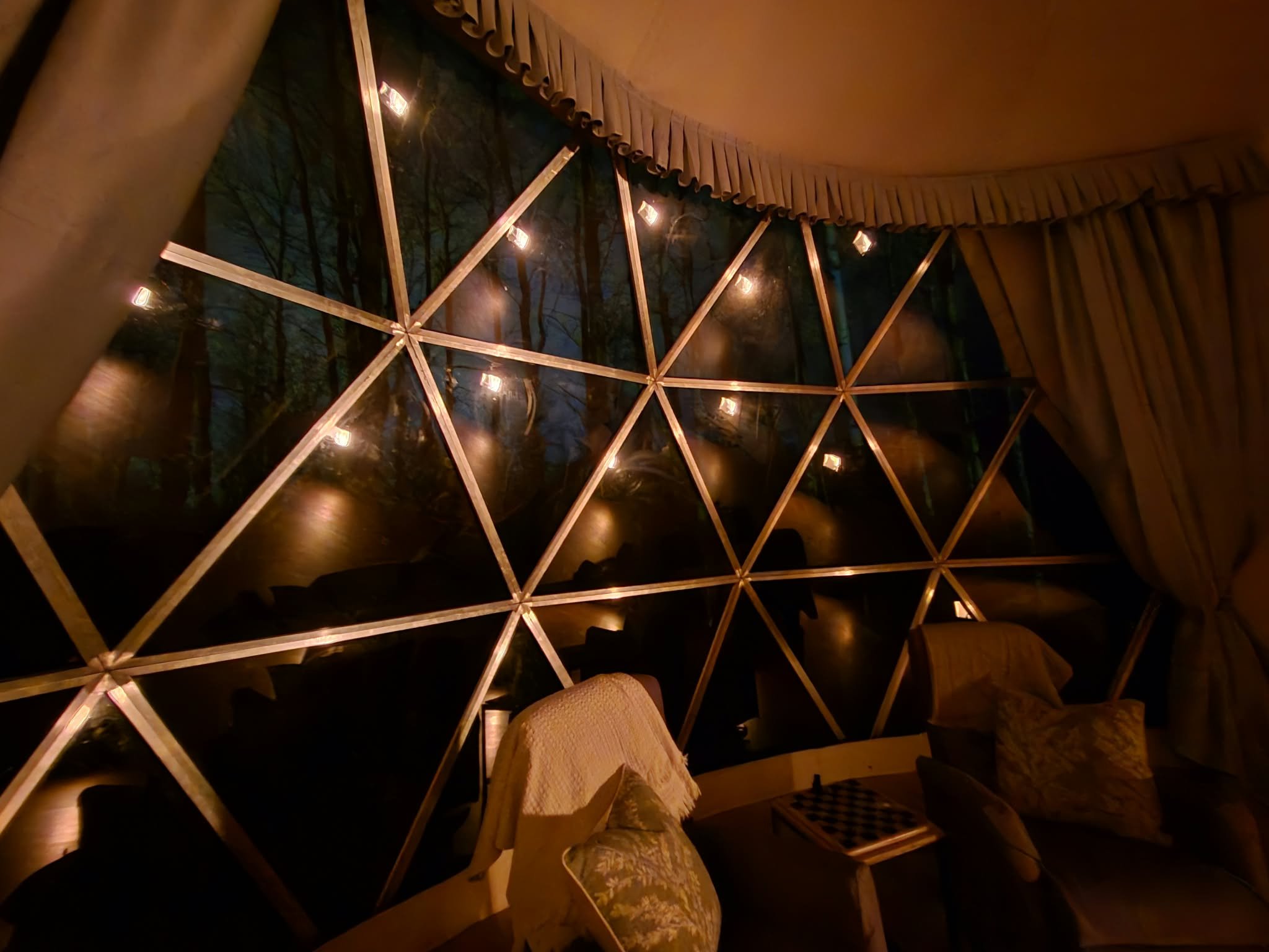 Light reflected in dome window, symbolizing remembrance and comfort. Sheri's Place