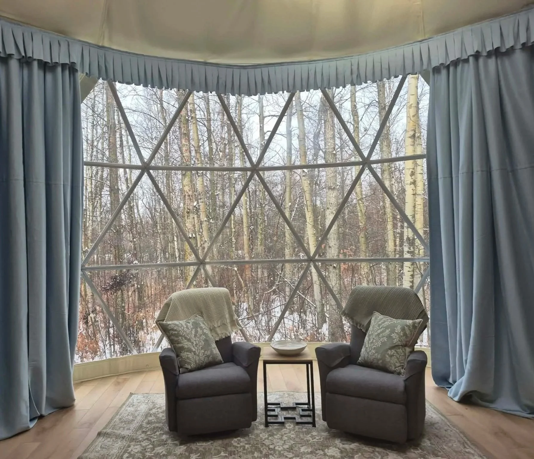 Empty chairs in a winter setting at Sheri's Place, reflecting quiet moments of grief and reflection