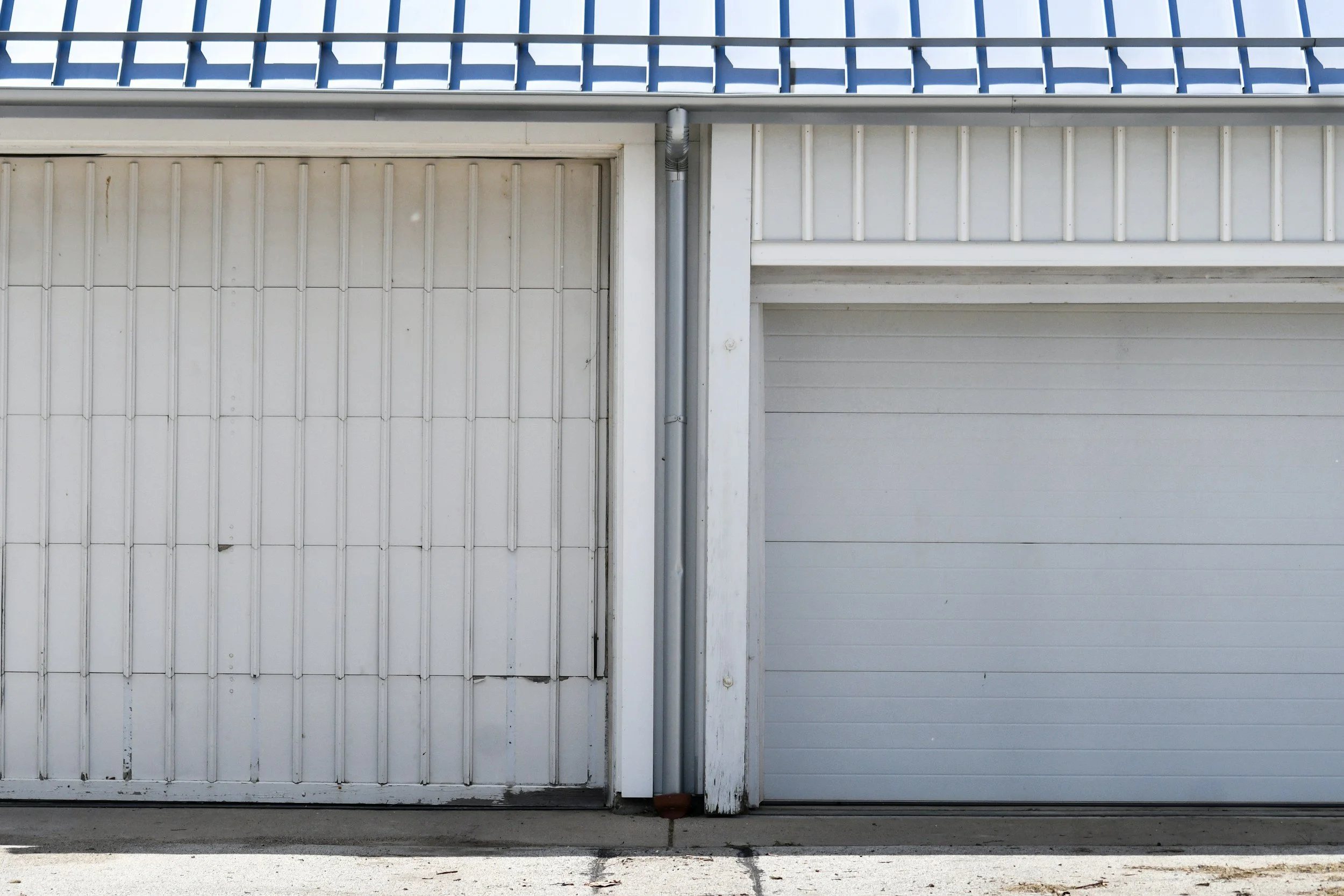 Simple metal storage building with roll-up door