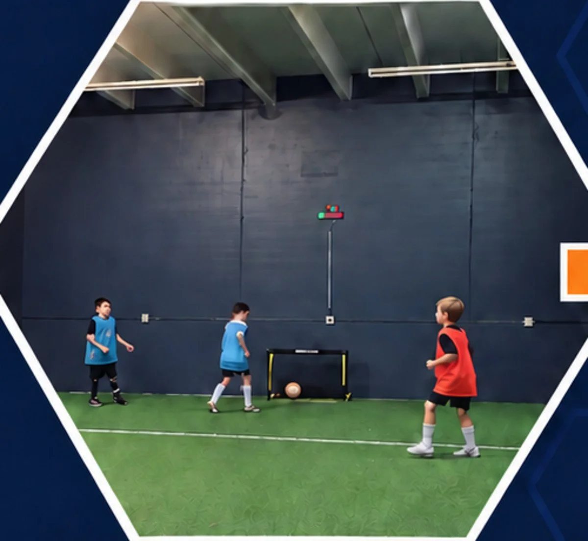 Young players practicing indoor soccer at Forge Fitness in Colorado Springs.