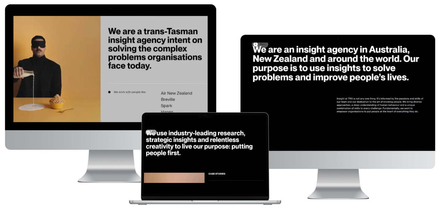Two computer monitors and a laptop display websites with text about a trans-Tasman insight agency and its mission to solve complex problems using research and insights.