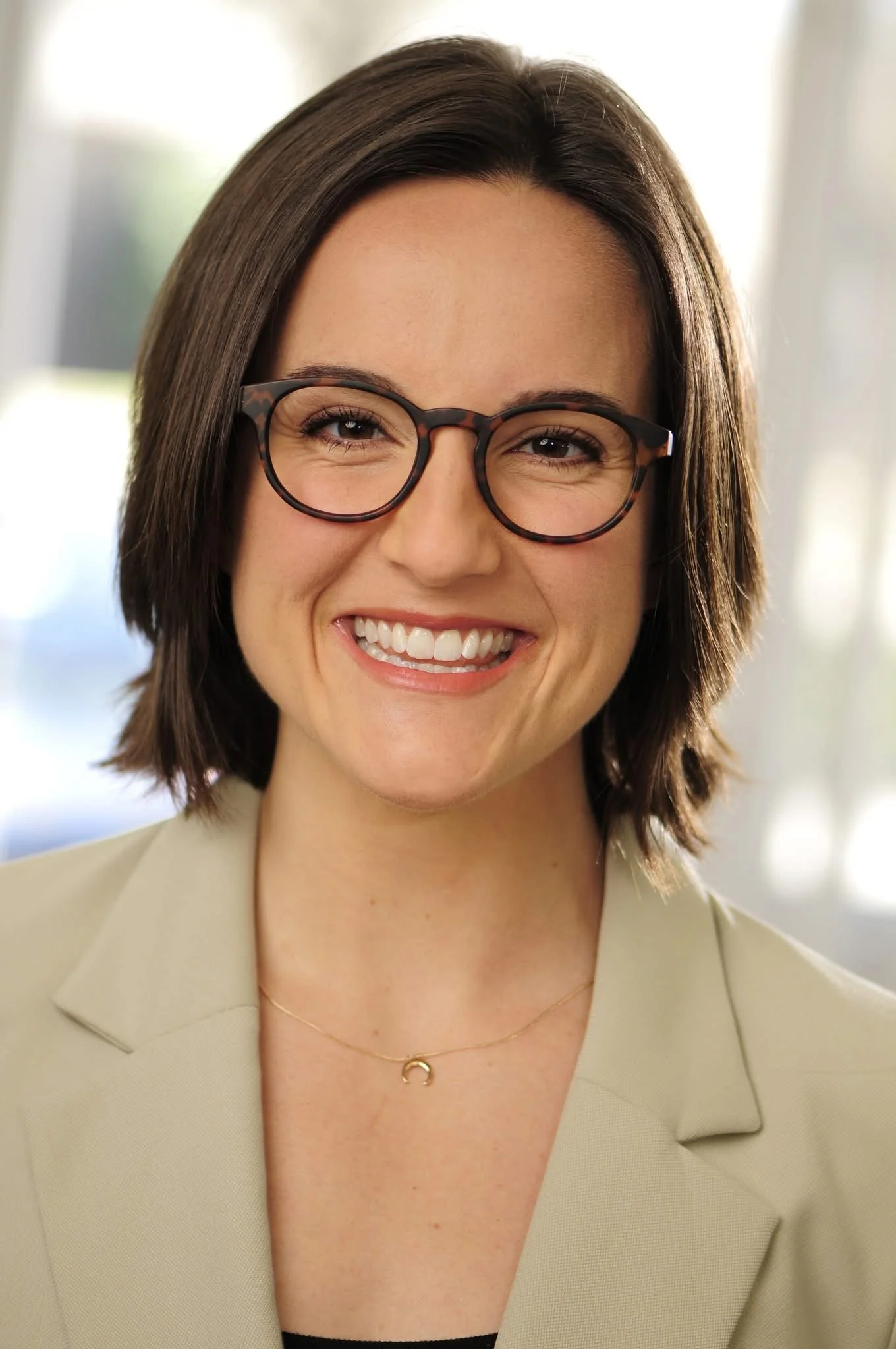 Woman smiling with glasses