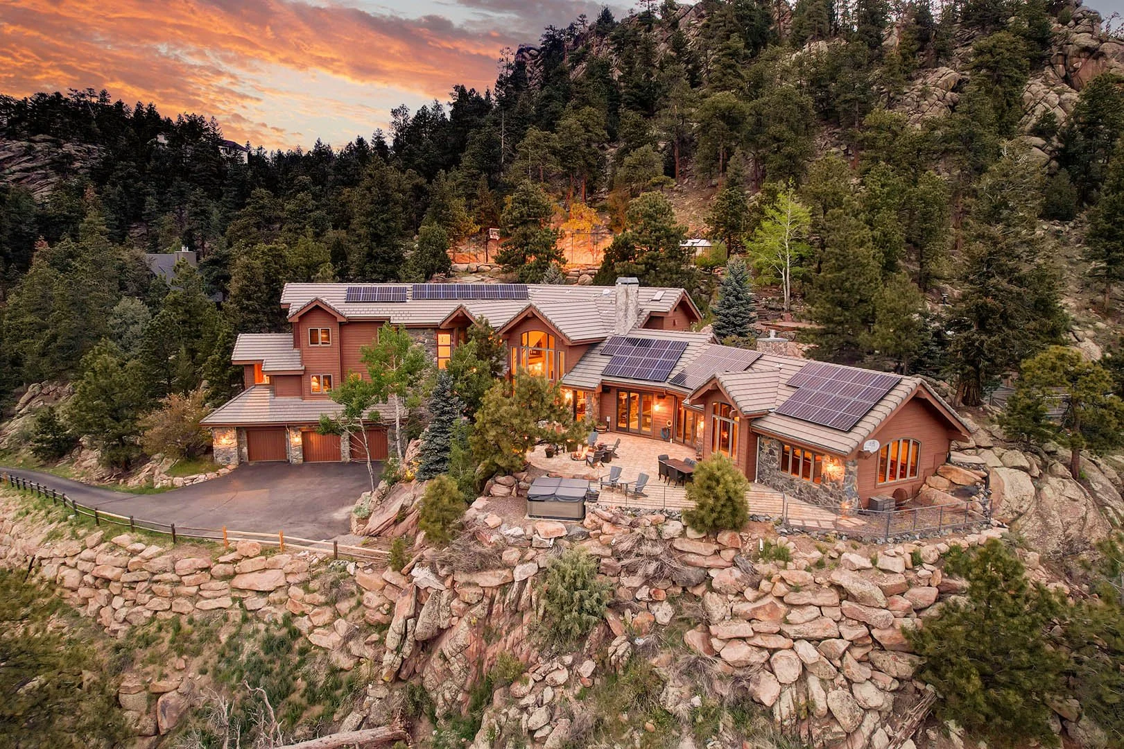 Exterior of the Sedalia residence at sunset, staged and represented by Joy Williams.