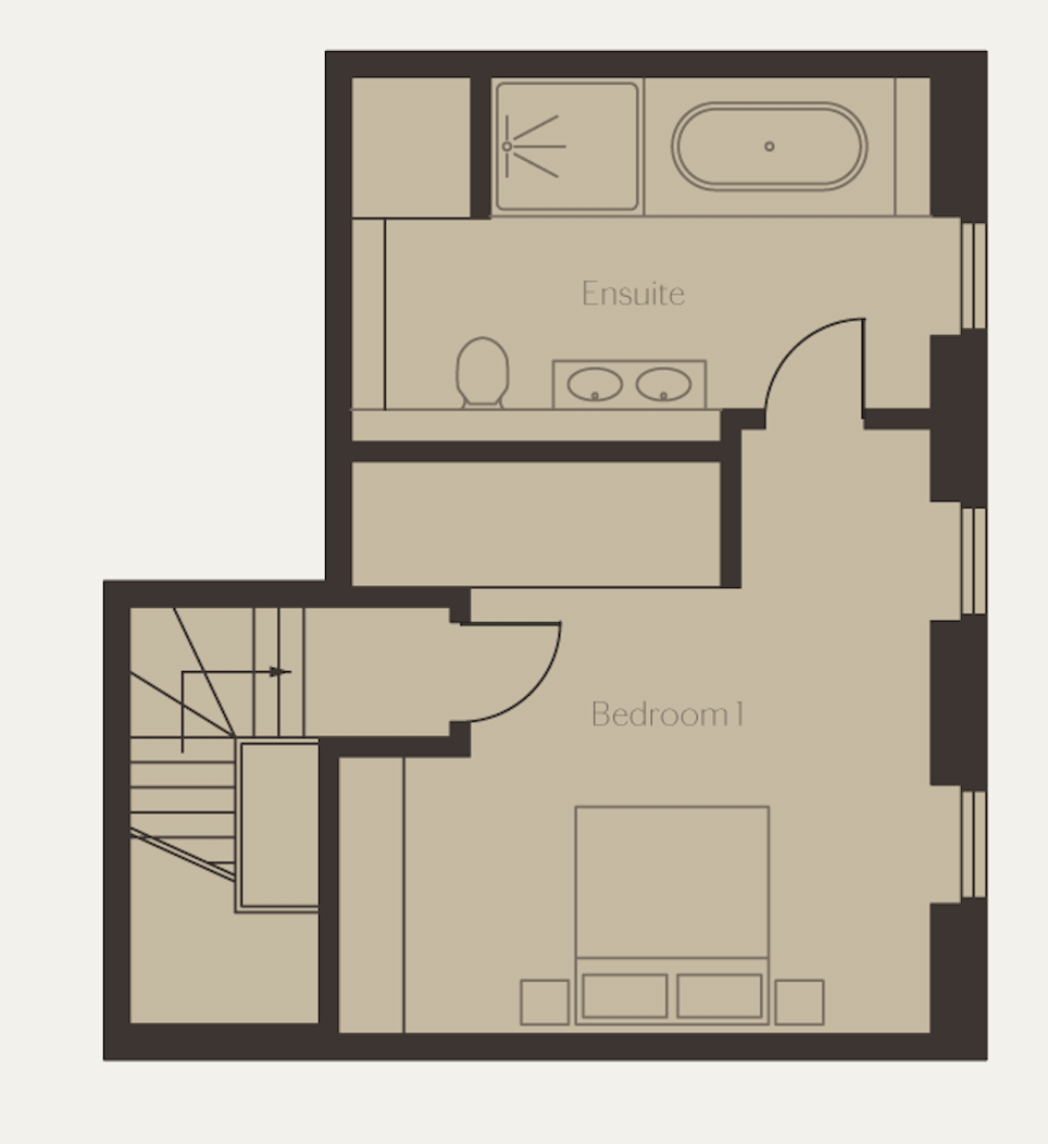 Floor plan of an upper story with a bedroom, an ensuite bathroom, and a staircase.