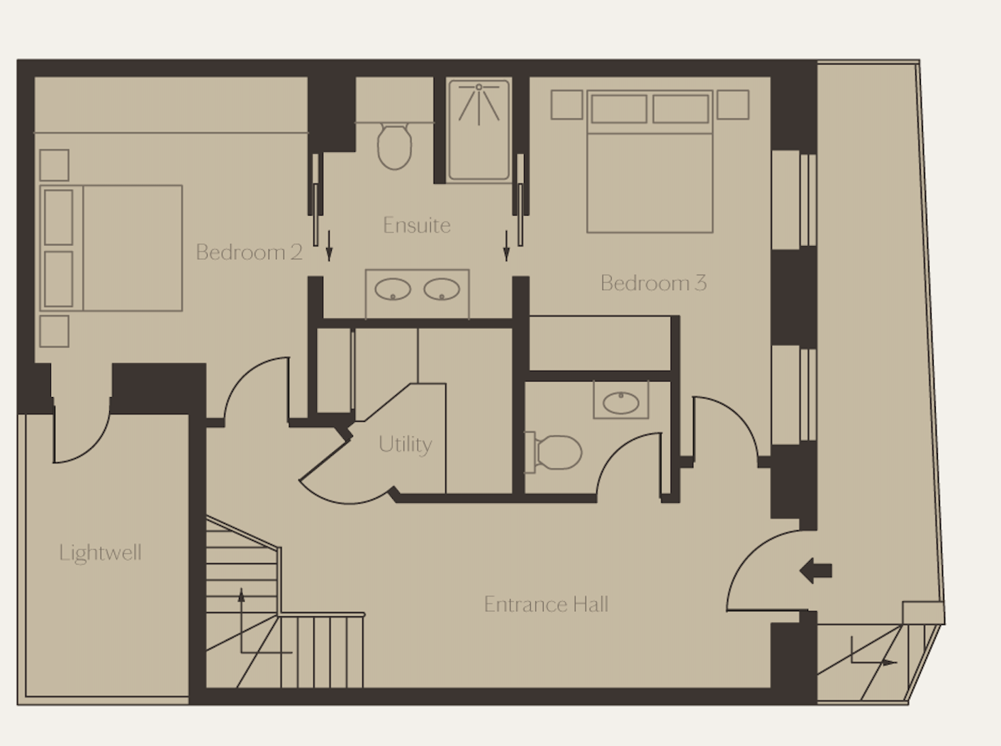 Floor plan of a residence showing an entrance hall, lightwell, utility room, two bedrooms with en suite bathrooms, a third bedroom, and staircases.