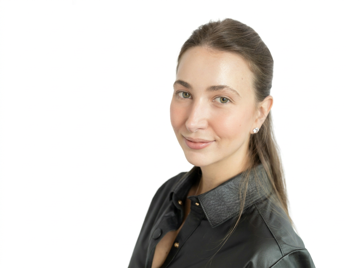 professional headshot of a woman smiling.