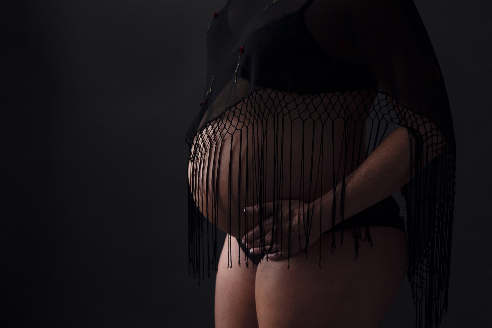 Victoria BC Studio maternity sessions belly closeup on black backdrop