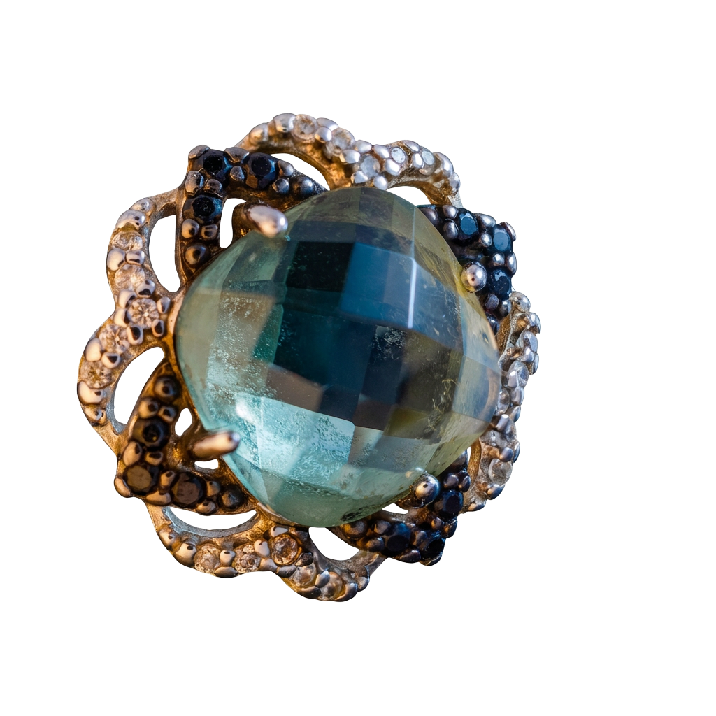 A ring with a large faceted greenish-blue gemstone, surrounded by a gold band with decorative dark-colored beads or small stones.