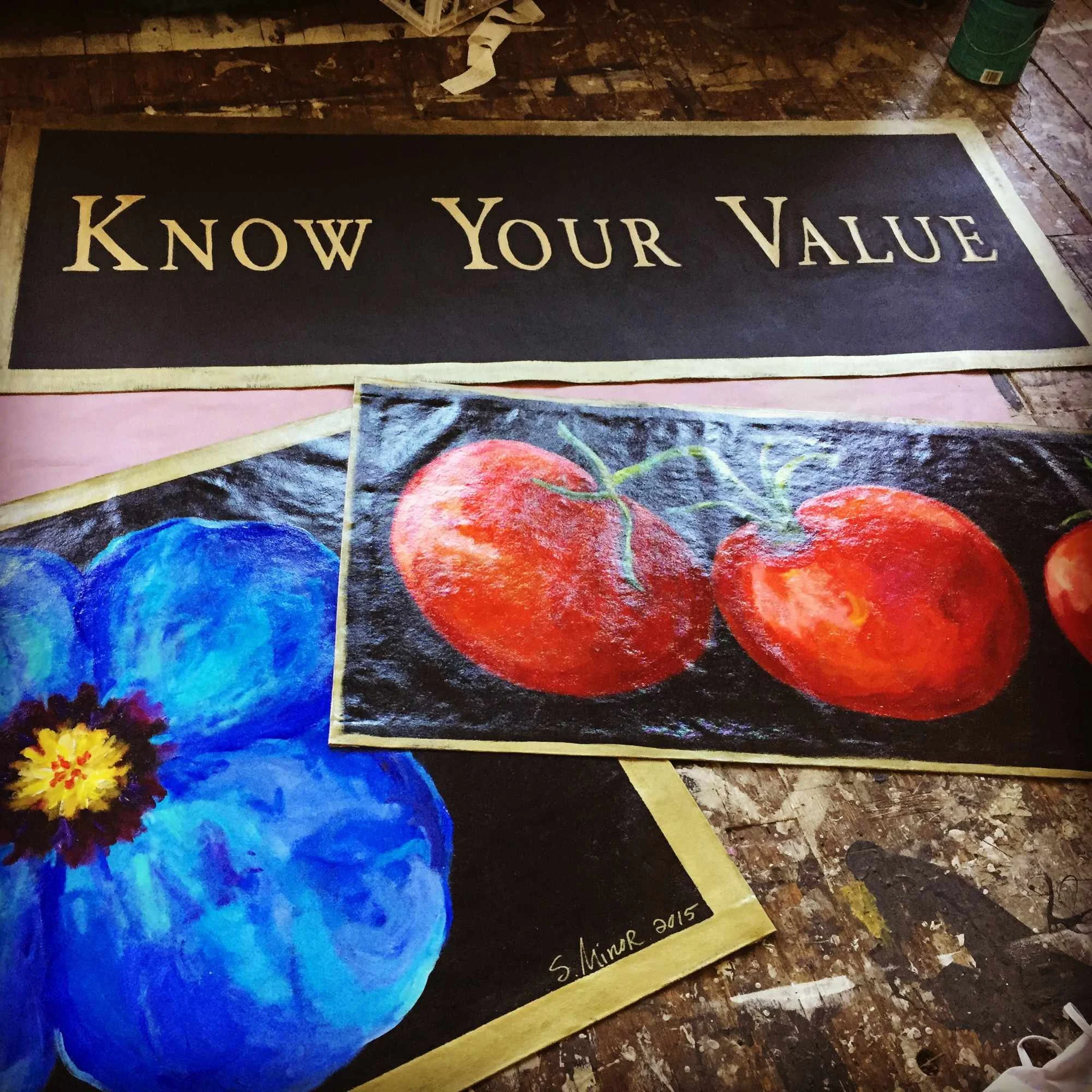 An assortment of hand-painted canvas floorcloths