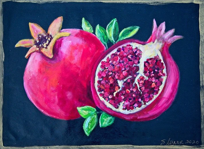 Painting of a whole pomegranate and a halved pomegranate with red seeds, green leaves, and a flower on a dark background.