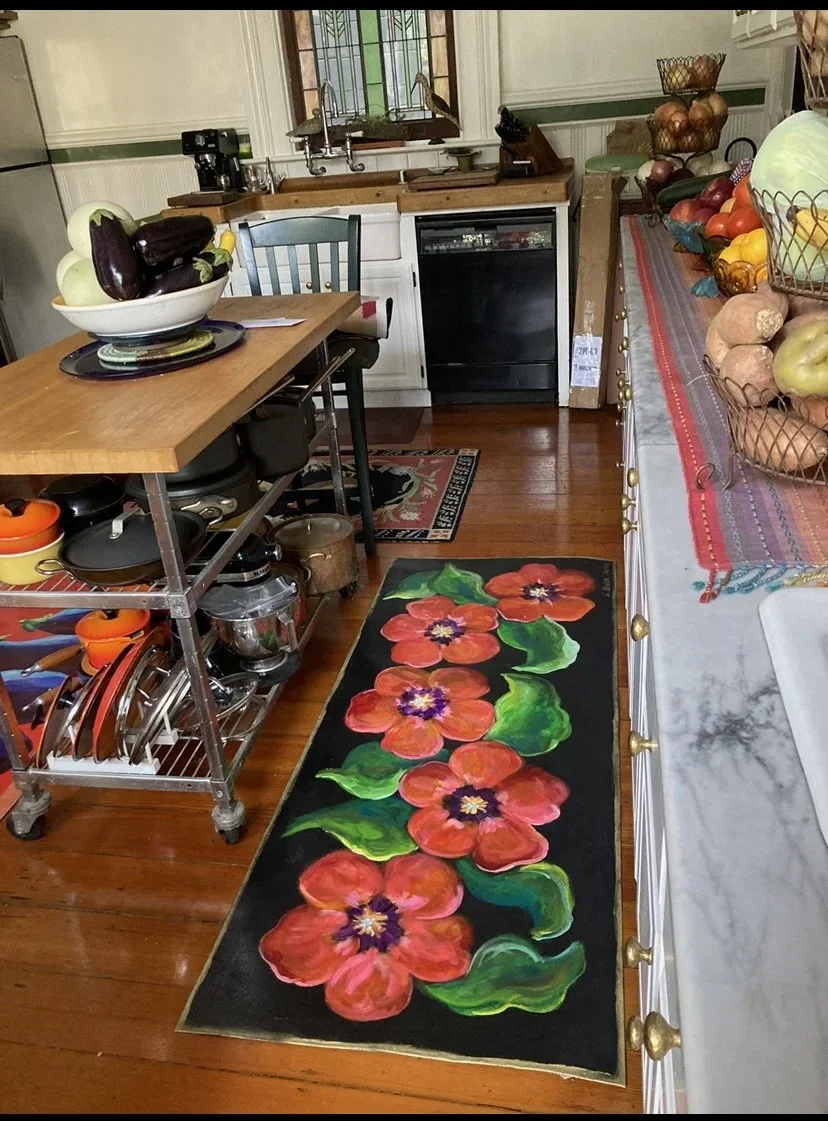 Kitchen with hand-painted canvas runner of red poppies on black background