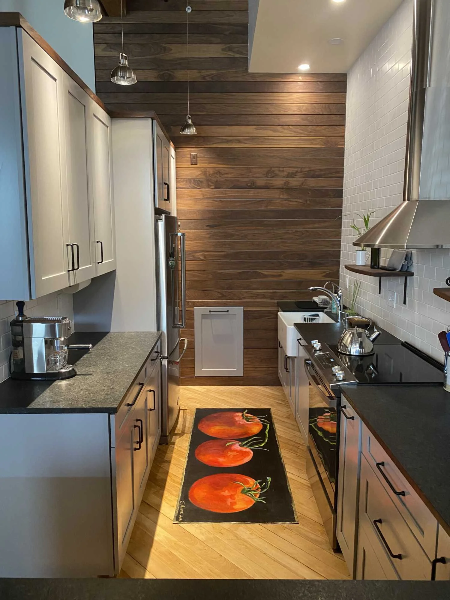 Kitchen with hand-painted canvas runner of tomatoes on black background