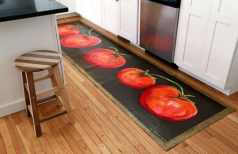 Kitchen with hand-painted canvas runner of tomatoes on black background