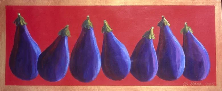 Eggplants on red canvas runner