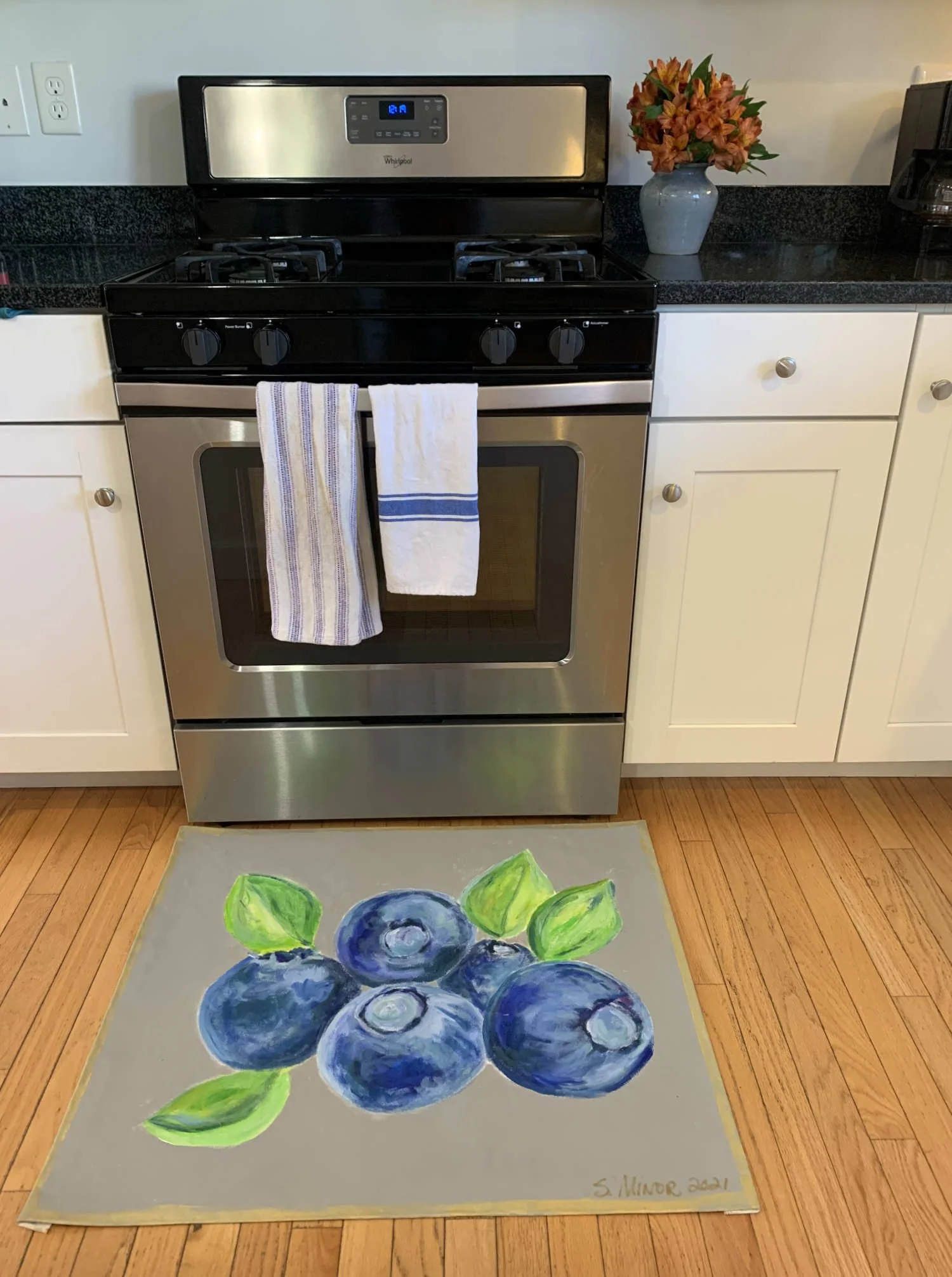 Kitchen with hand-painted canvas floorcloth of blueberries on gray background