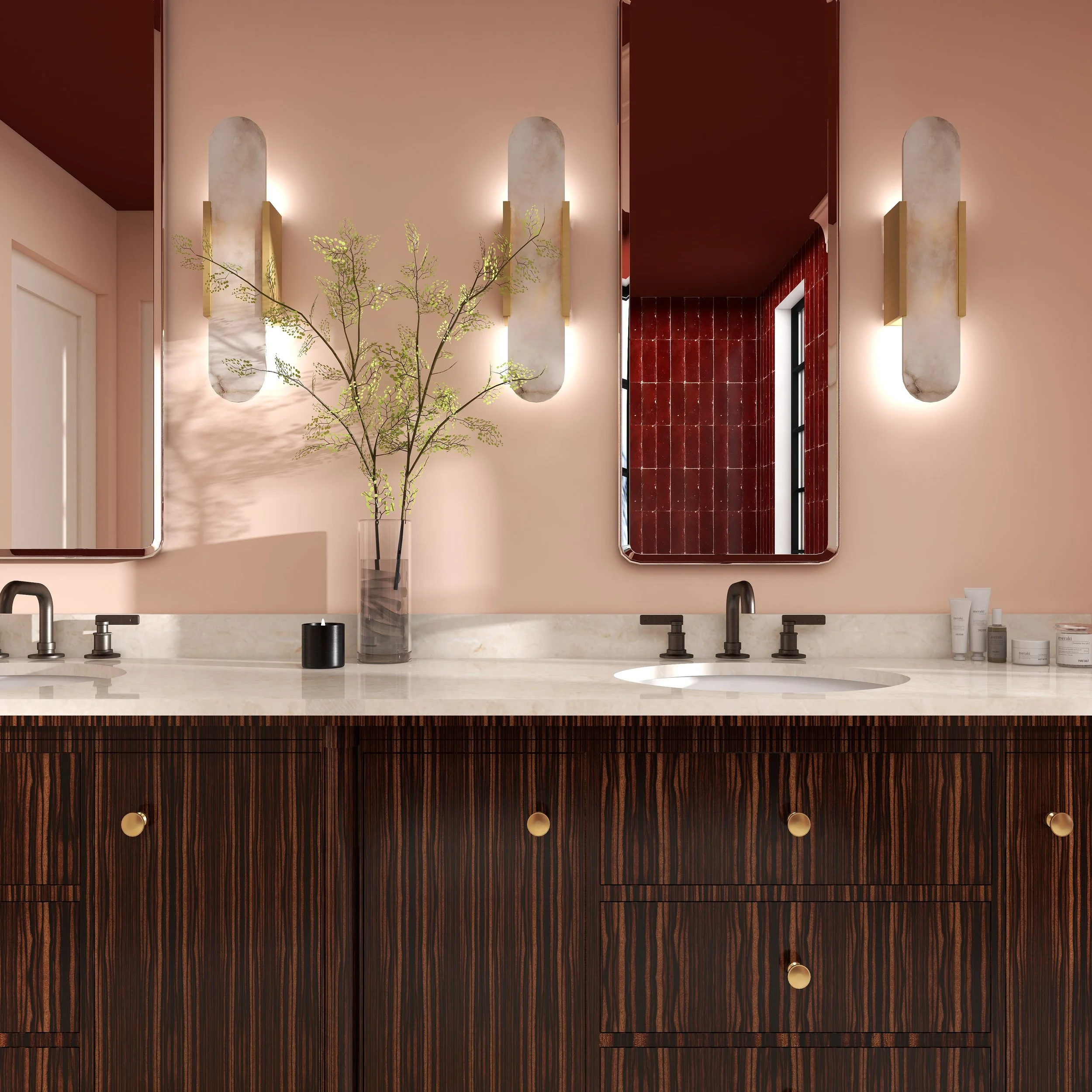 Modern bathroom with marble countertop, black faucets, a tall clear vase with green branches, and a wall with three elongated wall sconces and red tile accents. Photorealistic rendering not using AI generation tools.