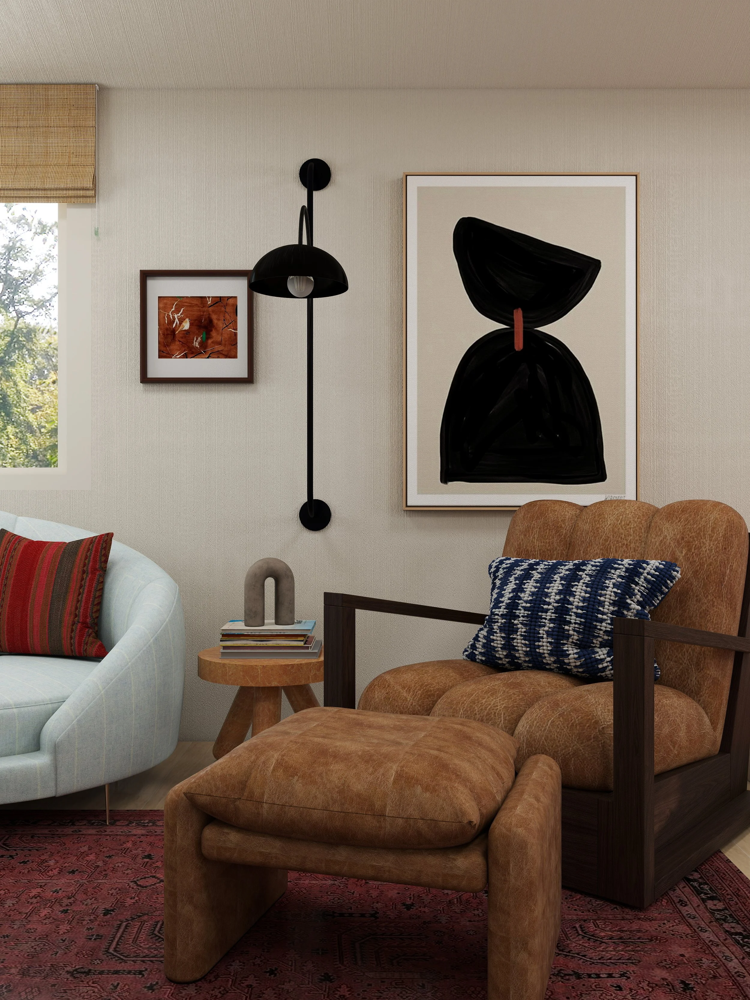 Living room corner with beige sofa and orange leather chaise lounge, small round wooden side table with books and a stone decorative sculpture, wall art with black abstract figure, window with woven blinds, and black wall-mounted lamp.