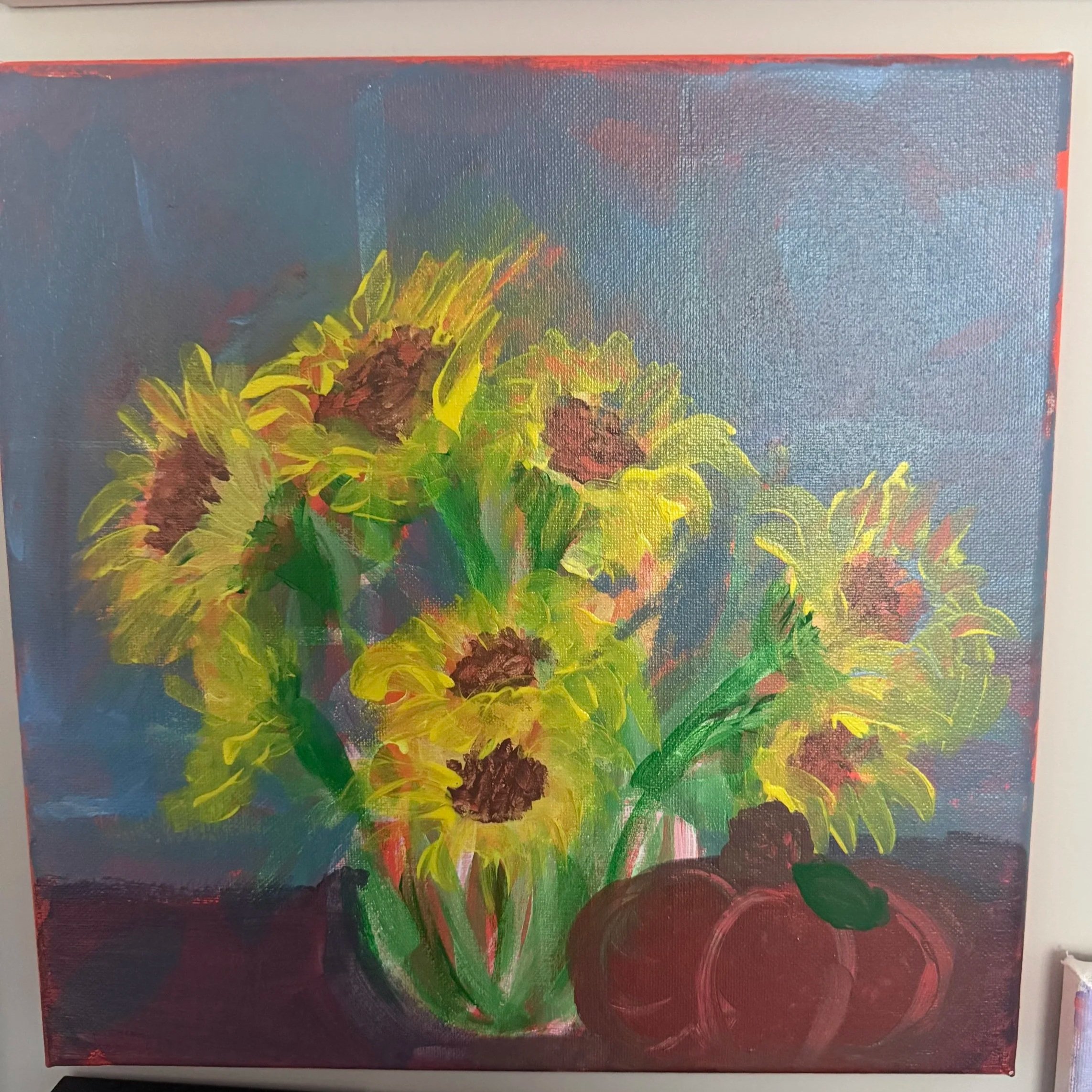 Abstract colorful painting on canvas with shades of yellow, green, brown, pink, blue, and red.