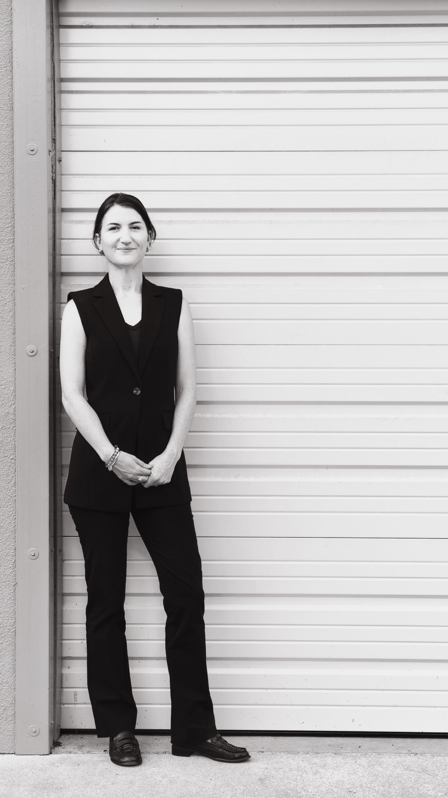Black and white portrait of Maureen Brown, founder of Exit with Mo