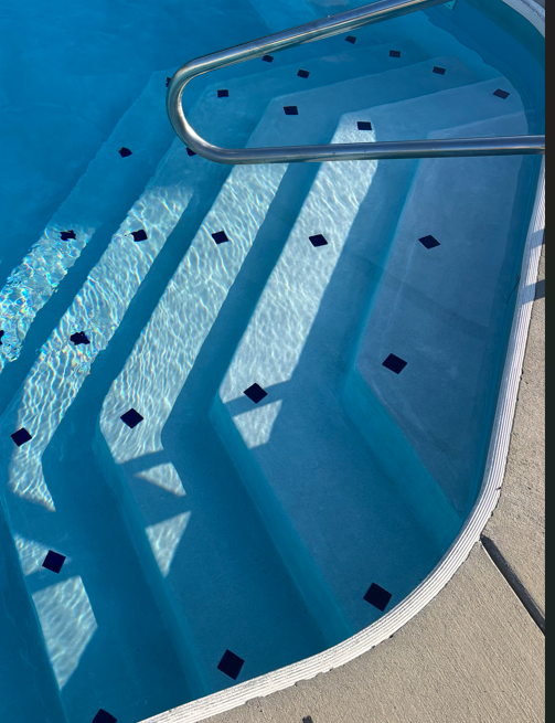 Clean commercial swimming pool maintained by Matter Pools