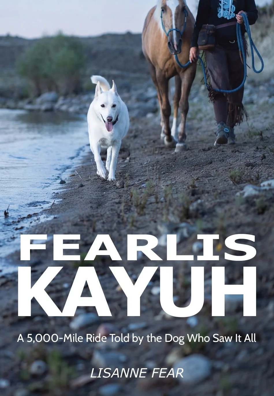 Cover of a book titled "Fearless Kayuh" showing a person walking a horse and a white dog on a beach at dawn or dusk.