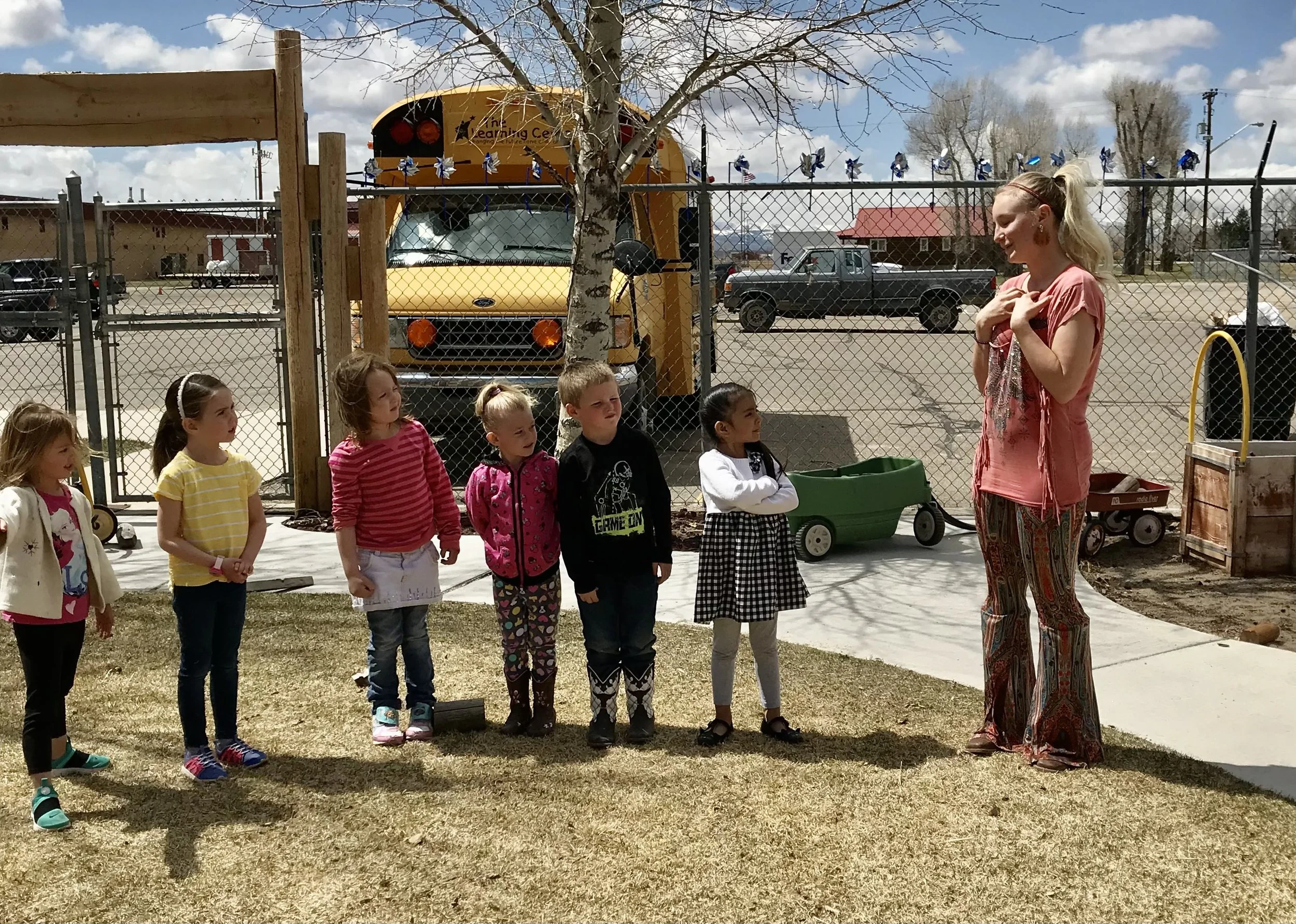 Lisanne Fear presenting with children of the Learning Center 
