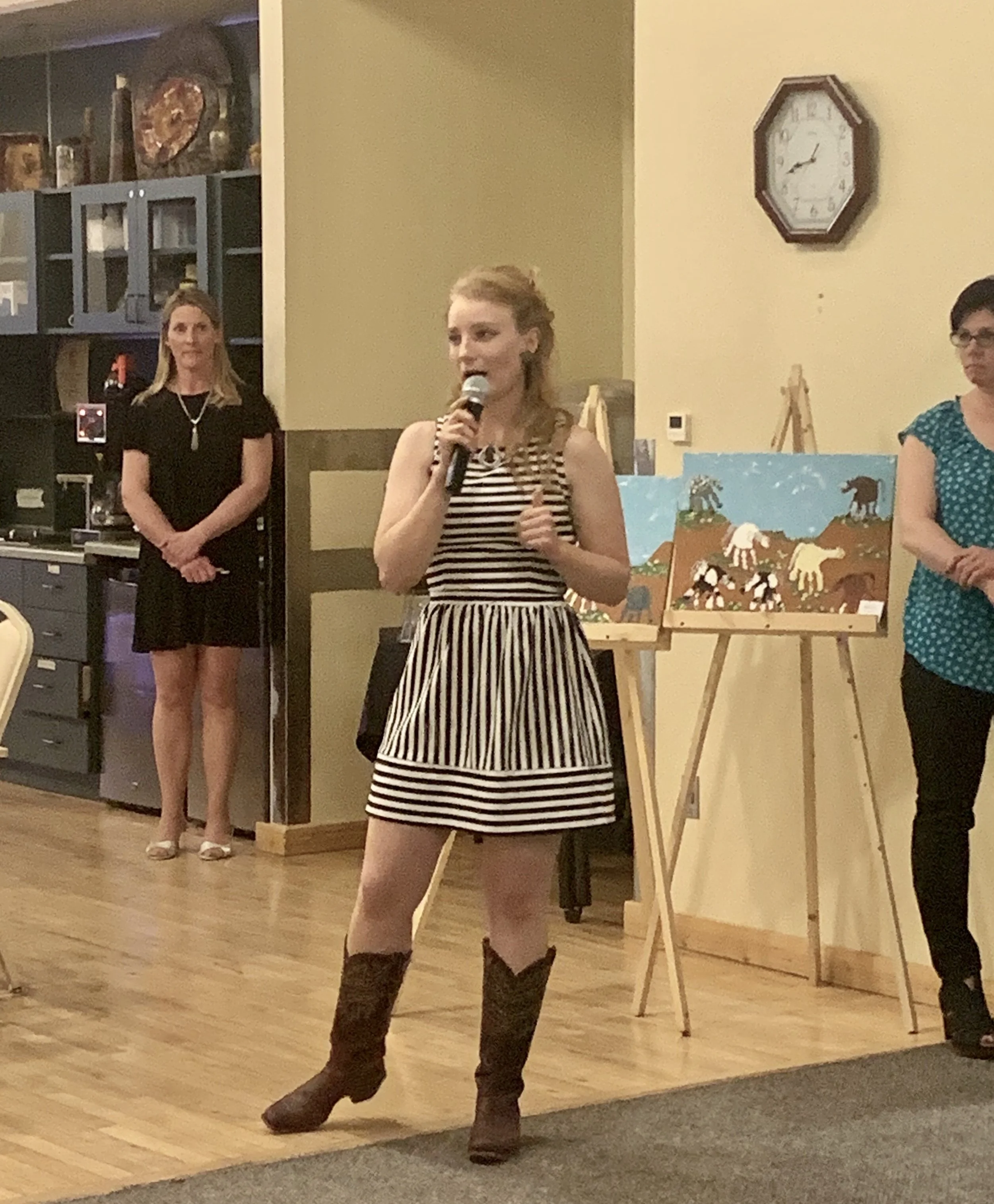 Lisanne Fear speaking at the Children's Learning Center Art Auction