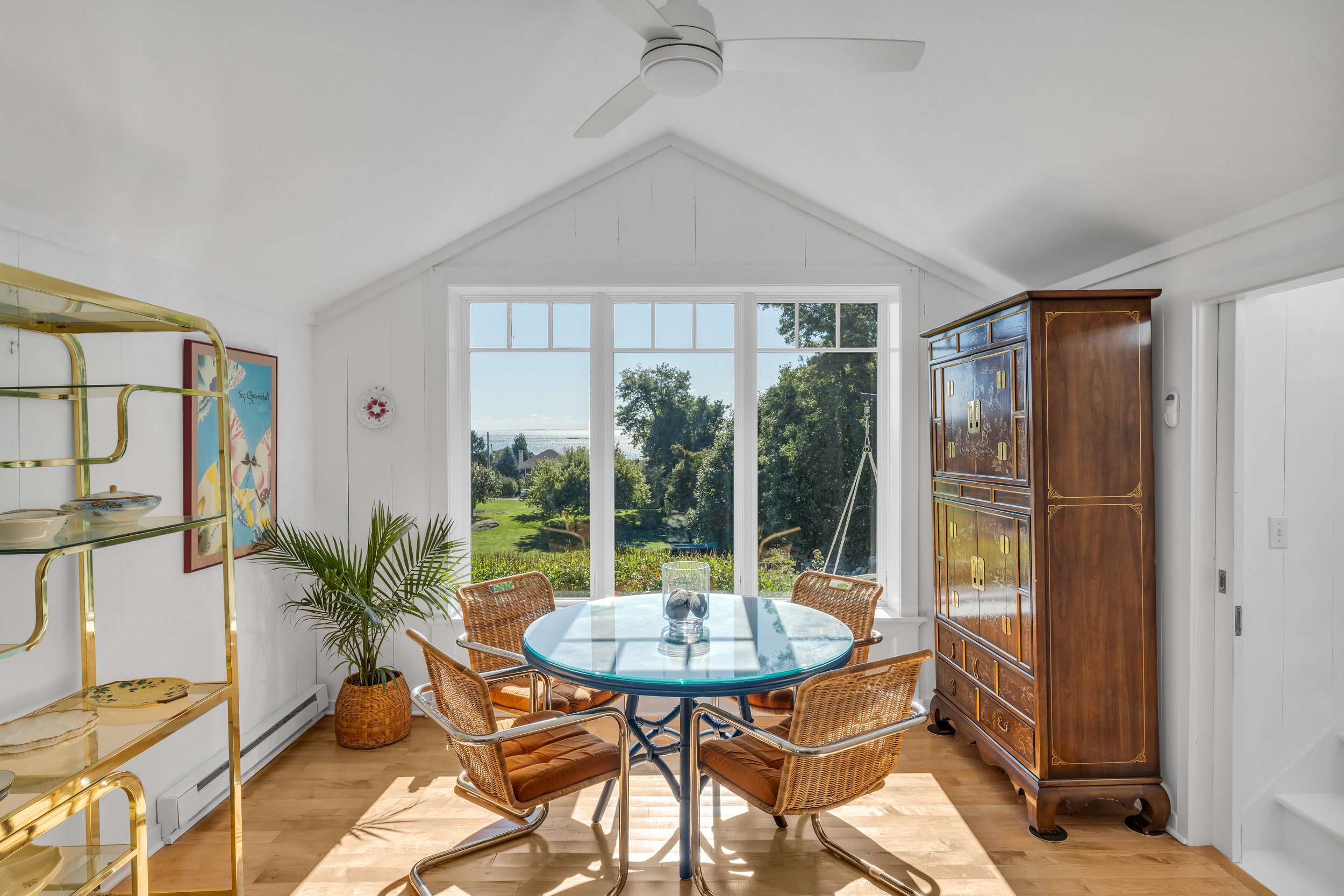 Chromecraft vintage rattan and chrome chairs, Ficks Reed table, Henredon chinoiserie cabinet