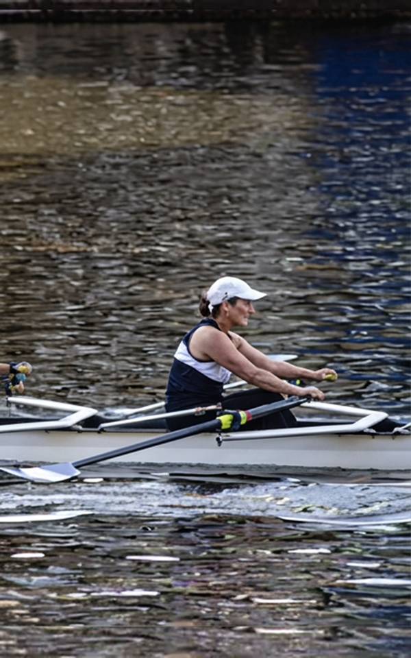 Amy rowing crew on the river
