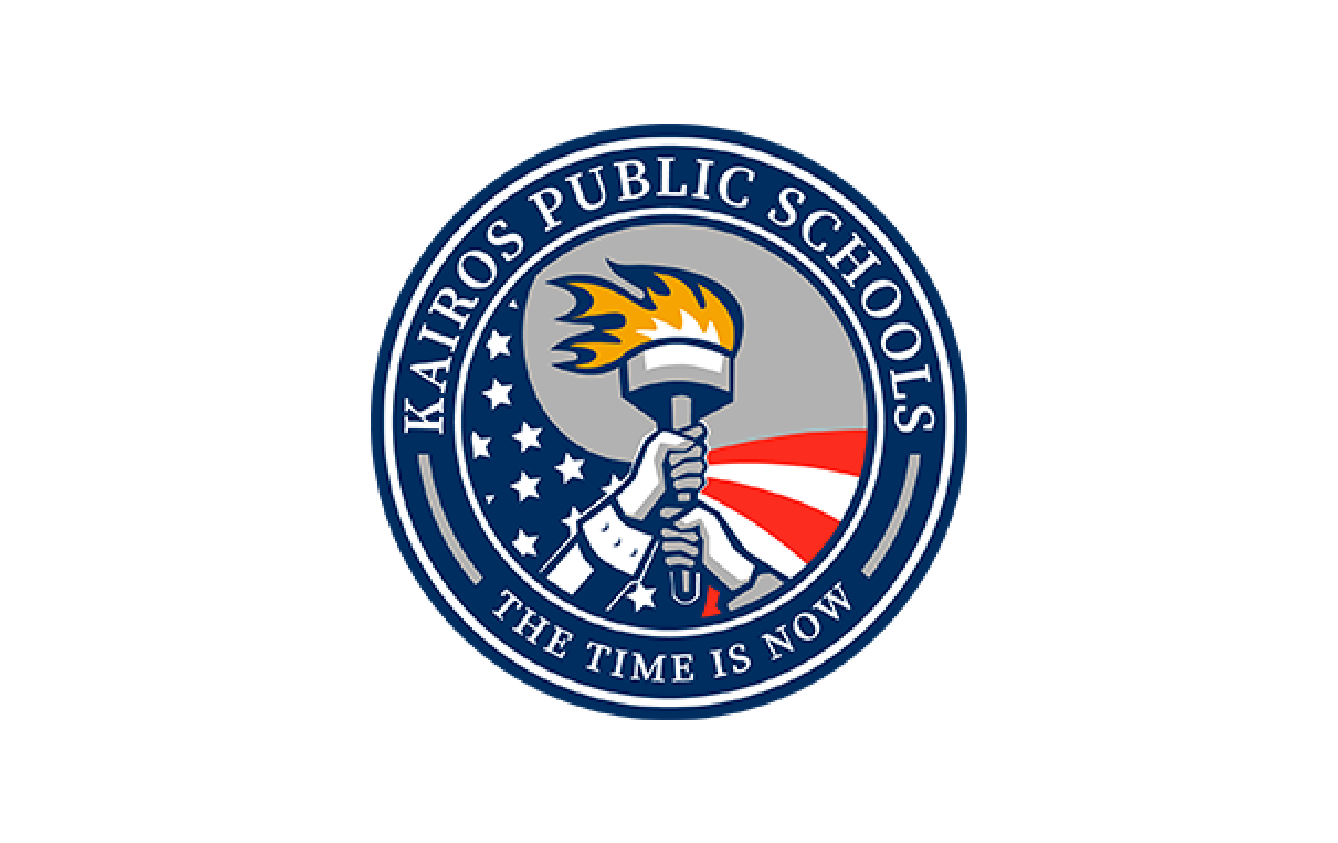 Logo of Kaisaros Public Schools featuring a hand holding a torch with flames, set against a background with stars and stripes and the phrase "The Time Is Now"