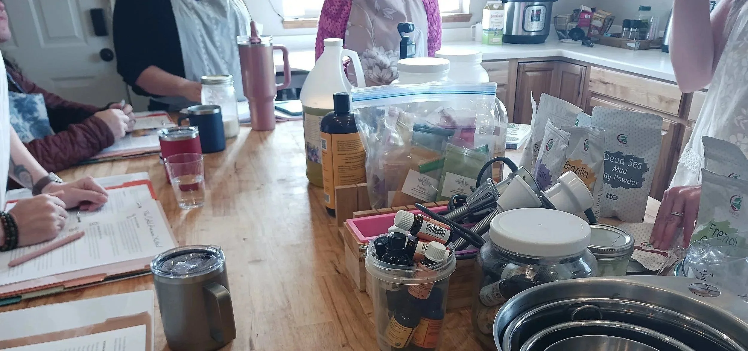 Women making soap together
