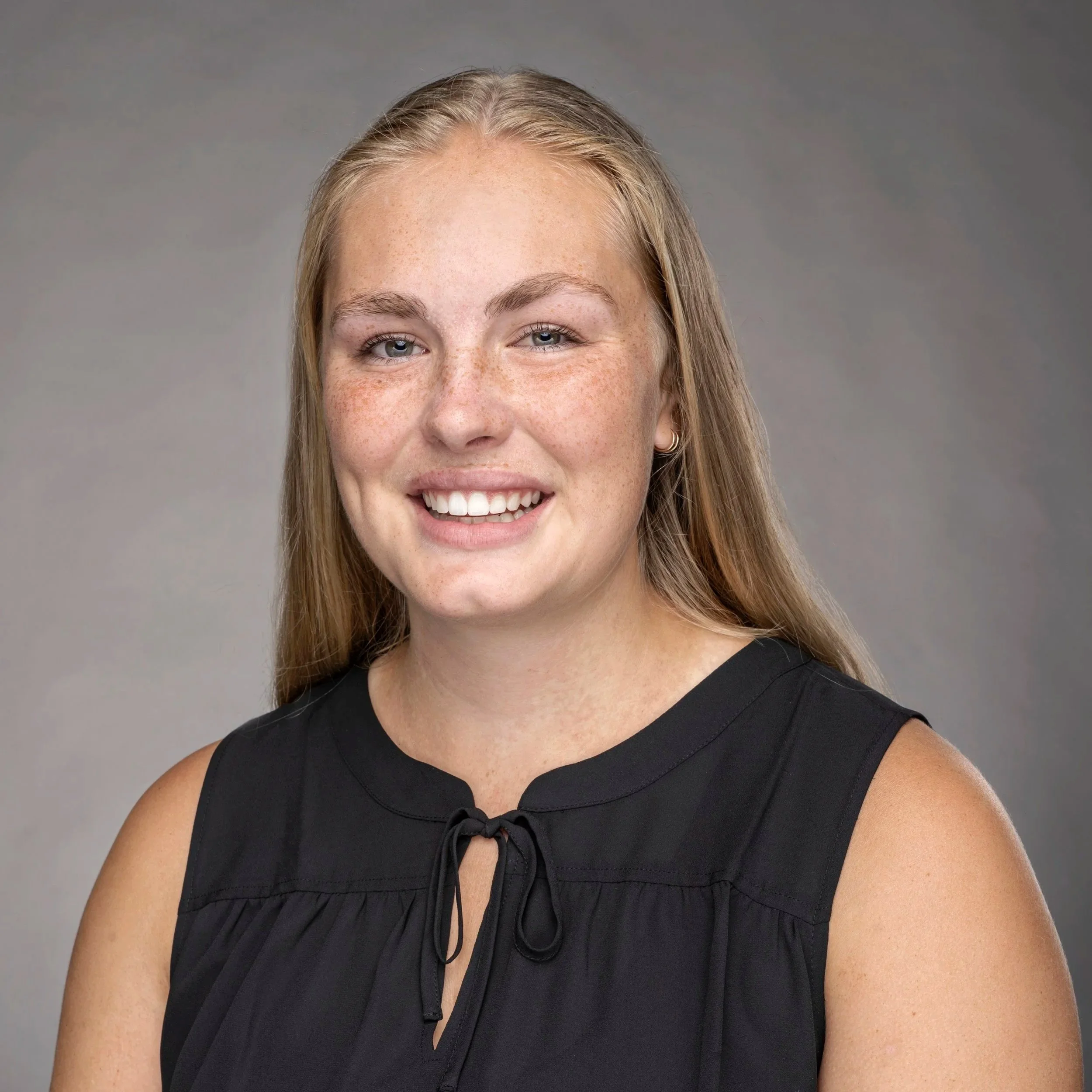 Olivia Bratzke, Director (Communications).
