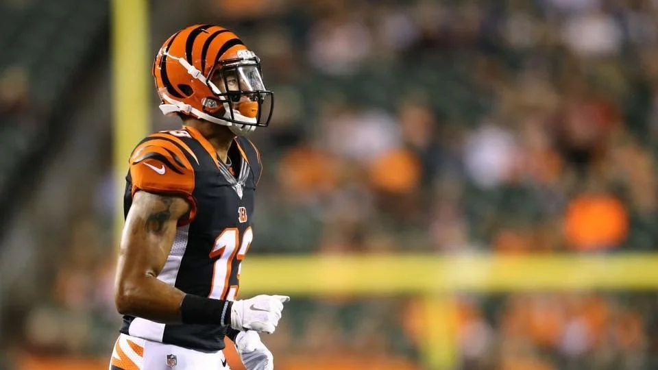 Rashaun Simonise competing in his Cincinnati Bengals number 13 jersey