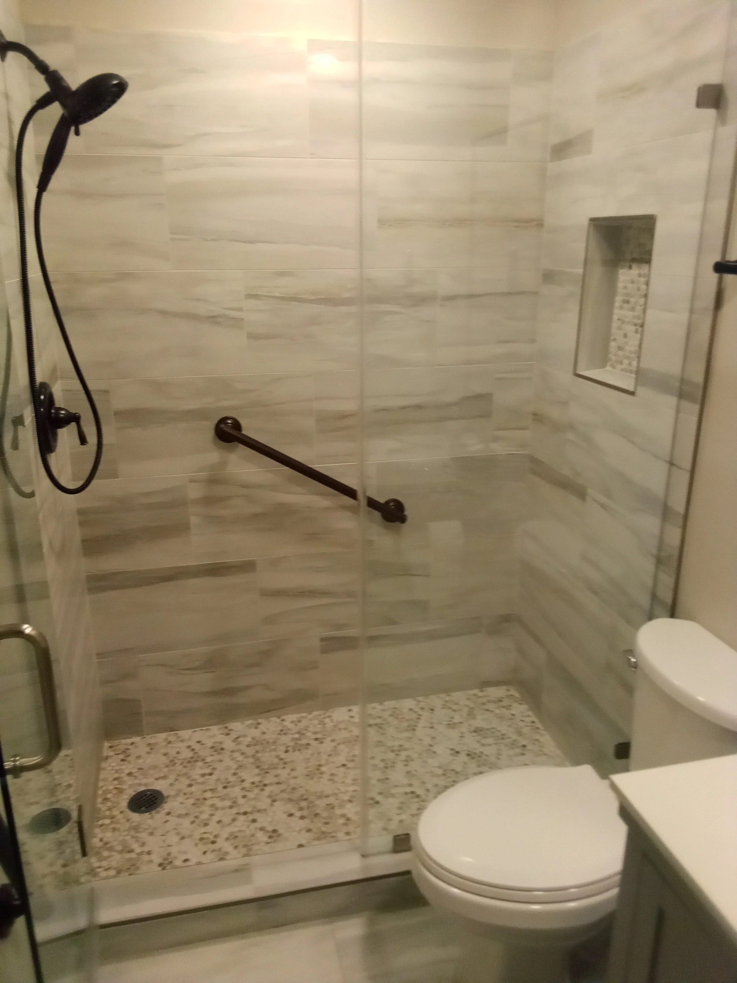 A standard tub to walk in shower conversion. I do these alot
