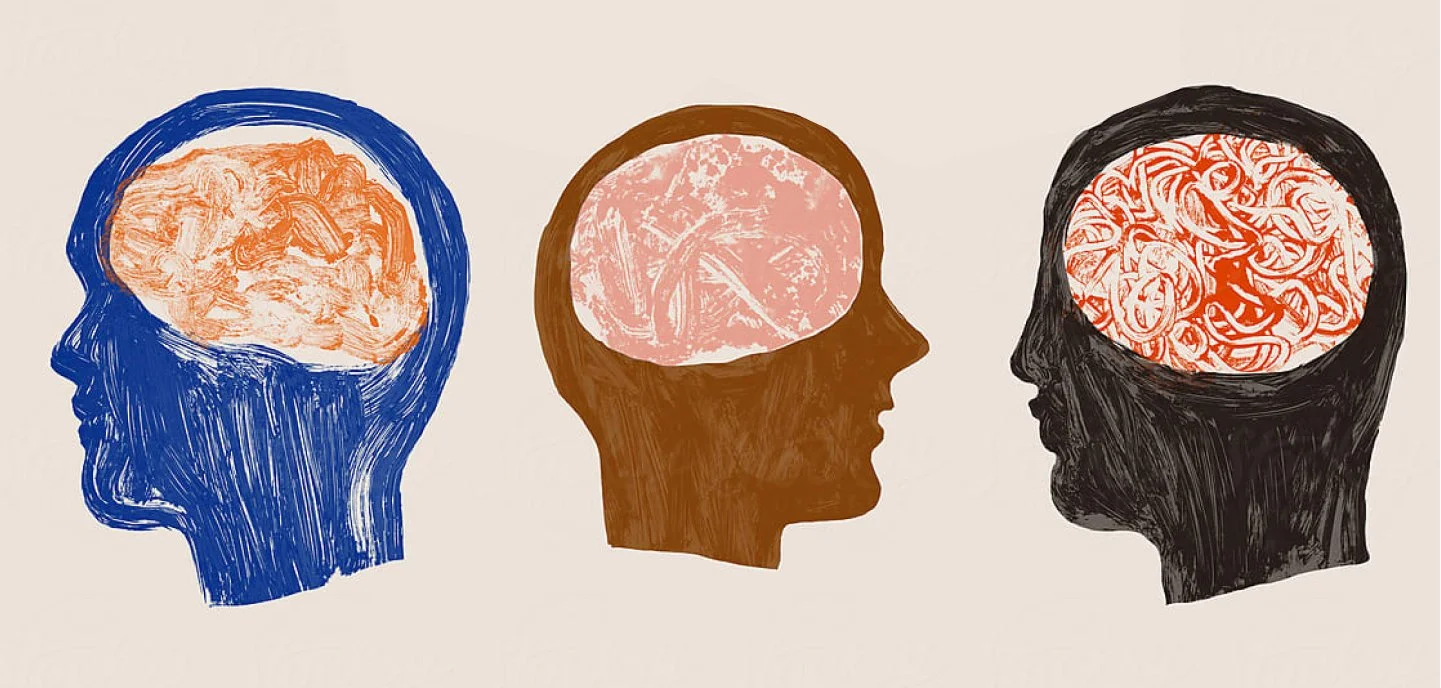 Side profiles of three human heads with colorful abstract brain illustrations inside.